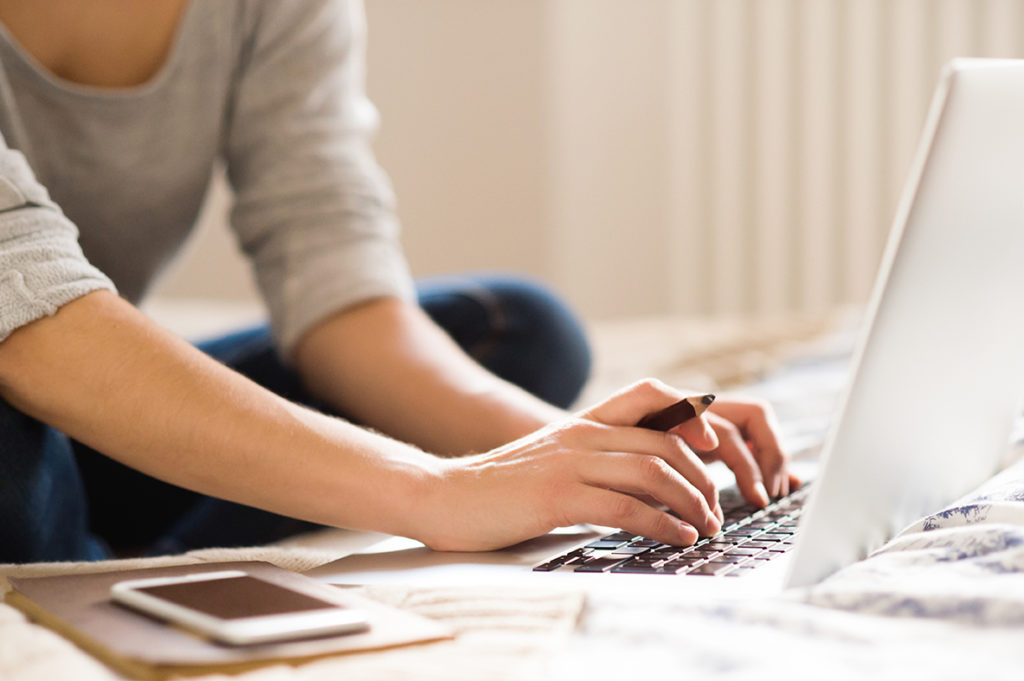 Woman working with fast internet on laptop